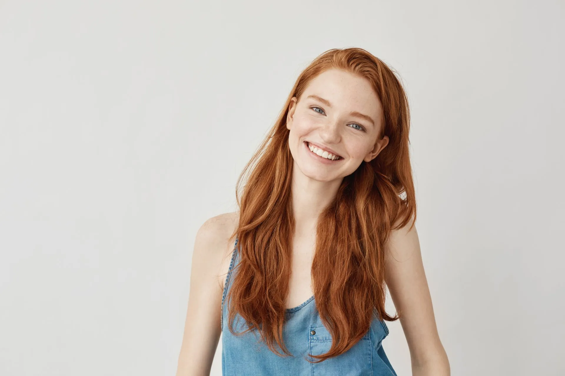 Young redheaded woman with beautiful smile and skin - Skinworks Skinsolutions Wellness & Aesthetics - Medspa Hendersonville, TN