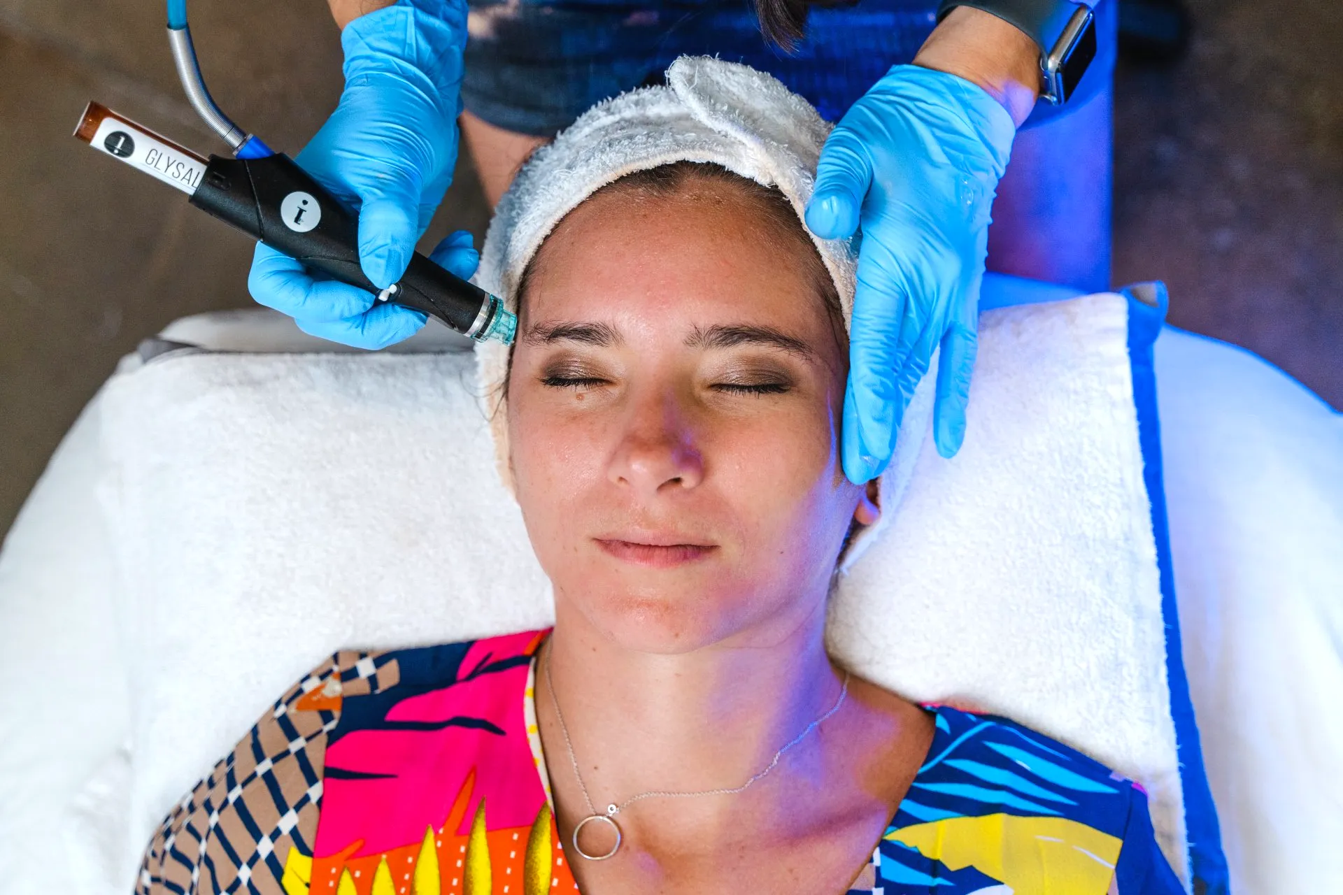 Woman at spa enjoying a hydra facial - Skinworks Wellness & Aesthetics