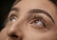 close up of a woman with brow lamination